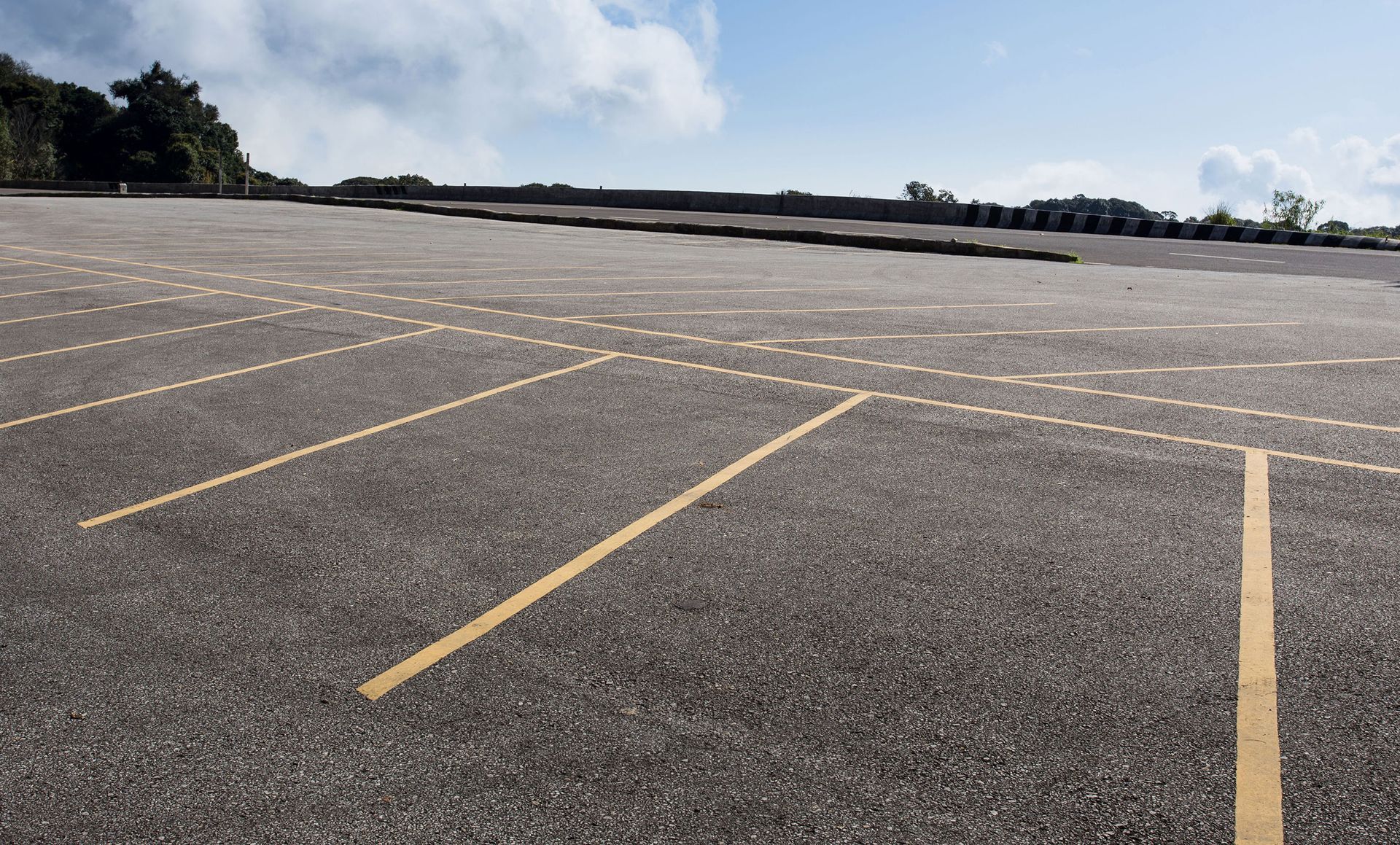 Newly paved and striped commercial parking lot