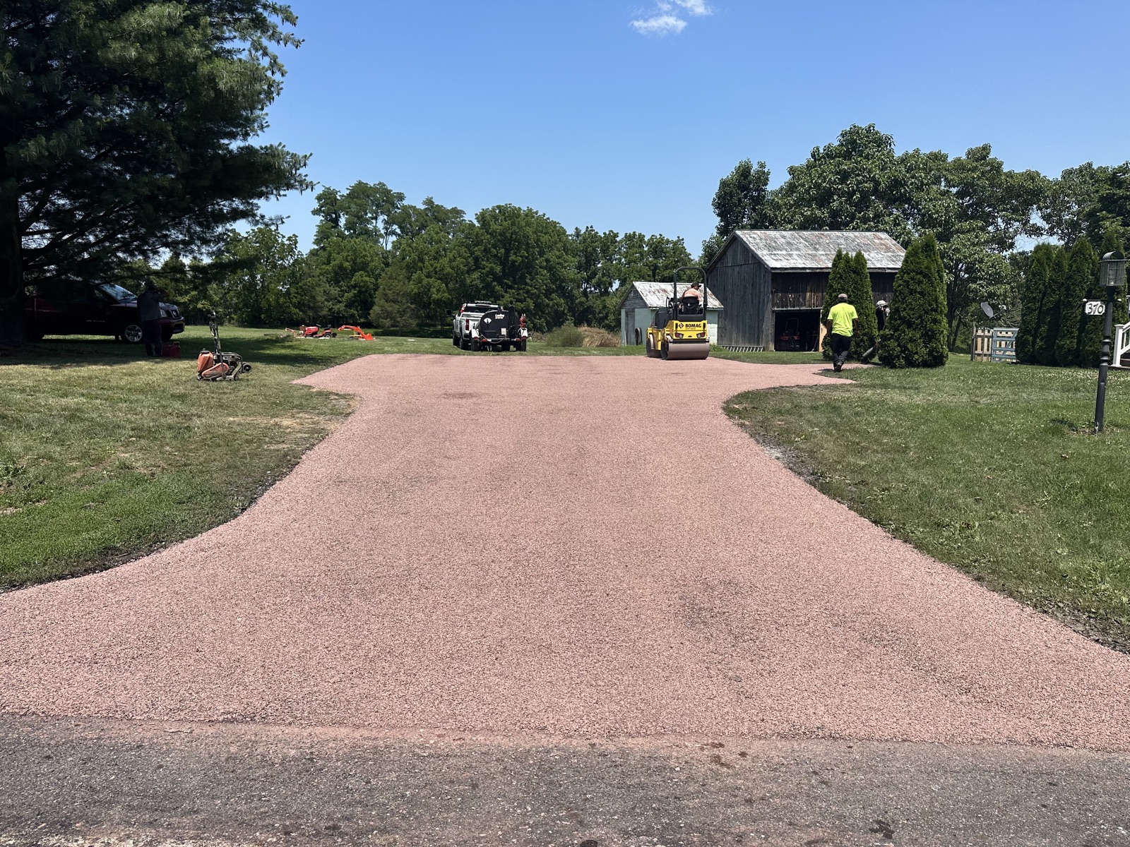 Tar and chip paved driveway with stone aggregate surface